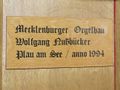Rheinsberg, St. Laurentius (Nußbücker-Orgel), Firmenschild.JPG