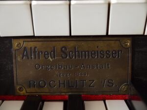 Schönfels, Dorfkirche, Firmenschild.JPG